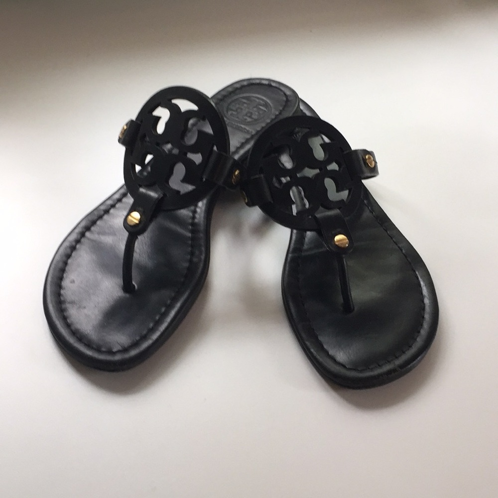 Tory Burch black leather flip flops